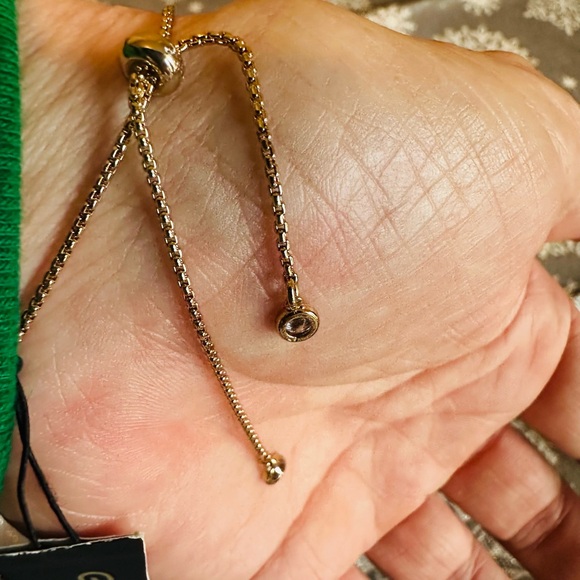 Givenchy Bracelet NWOT as it felll off.  Cubic Zirconia and Gold. Sliding sizer - Picture 5 of 5